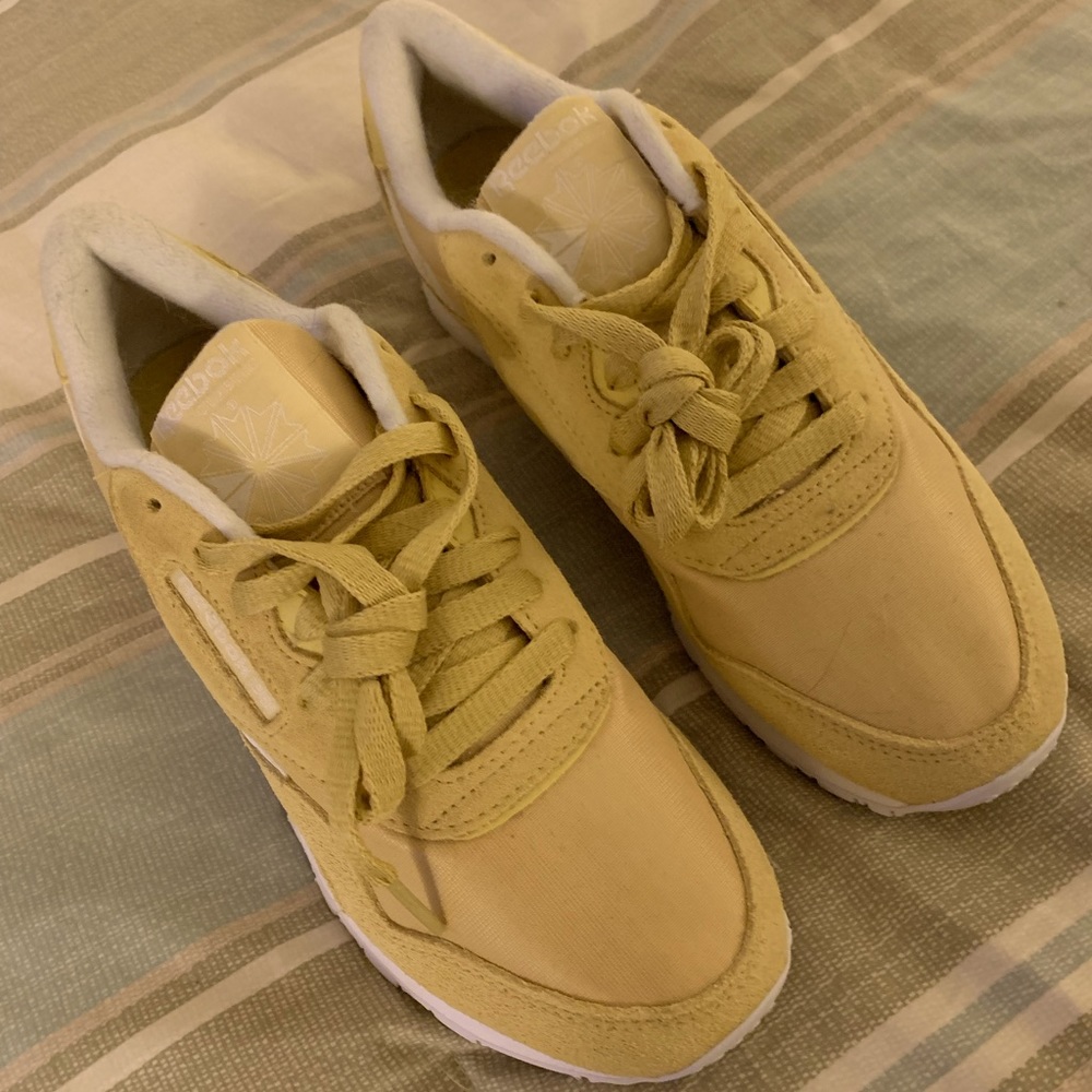 Yellow Rebook gym shoes size 7.5.